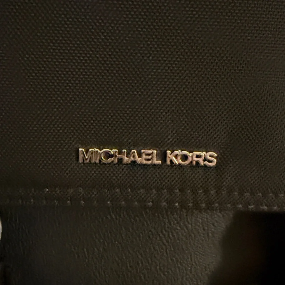 #177. Michael Kors Backpack